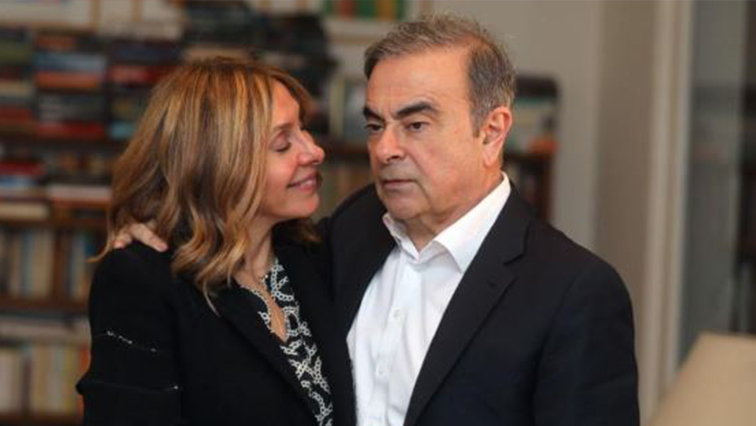 Former Nissan chairman Carlos Ghosn and his wife Carole Ghosn pose for a picture after an exclusive interview with Reuters.