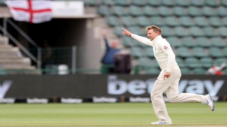 England's Joe Root celebrates taking the wicket of South Africa's Pieter Malan.