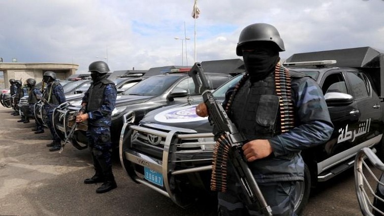 Central security support force carry weapons during the security deployment in the Tajura neighborhood, east of Tripoli, Libya.