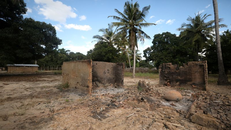 FILE IMAGE: Burnt-out huts are seen at the scene of an armed attack in Chitolo village, Mozambique