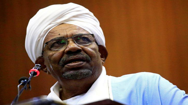 Sudan's former president Omar al-Bashir delivers a speech inside Parliament in Khartoum.