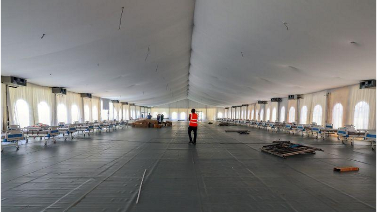 A man walks inside a new isolation and treatment centre at the Mobolaji Johnson Arena (formerly Onikan Stadium), erected as an additional measure to handle the outbreak of the coronavirus disease  in Lagos, Nigeria, on March 27, 2020.