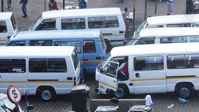 File image: Taxis are parked at a taxi rank.