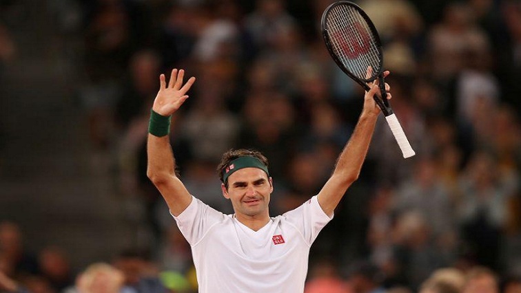 Switzerland's Roger Federer celebrates after winning the exhibition match against Spain's Rafael Nadal.