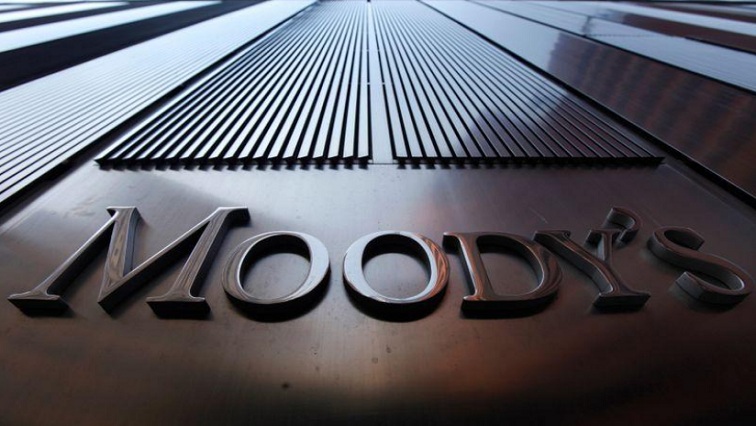 A Moody's sign on the 7 World Trade Center tower is photographed in New York, file.