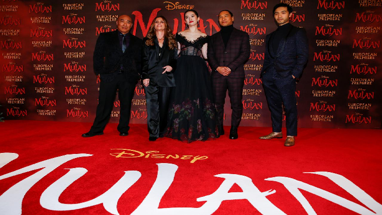 Cast members Ron Yuan, Yifei Liu, Jason Scott Lee and Yoson An pose with director Niki Caro, at the European premiere for the film "Mulan" in London, Britain.