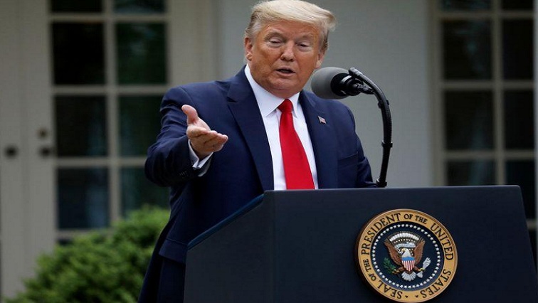 U.S. President Donald Trump addresses the daily coronavirus task force briefing in the Rose Garden at the White House in Washington, U.S., April 14, 2020.