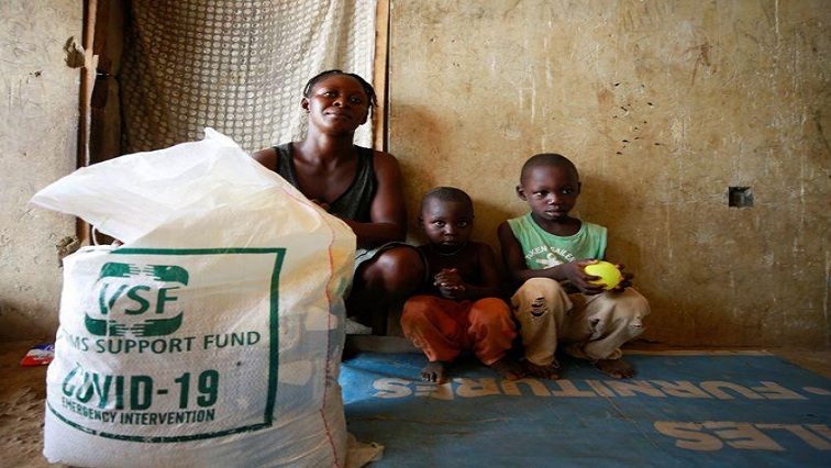 Internally displaced families receive food items from Nigeria's Victims Support Fund, as the authorities struggle to contain the coronavirus disease (COVID-19) outbreak, in Abuja, Nigeria April 14, 2020.