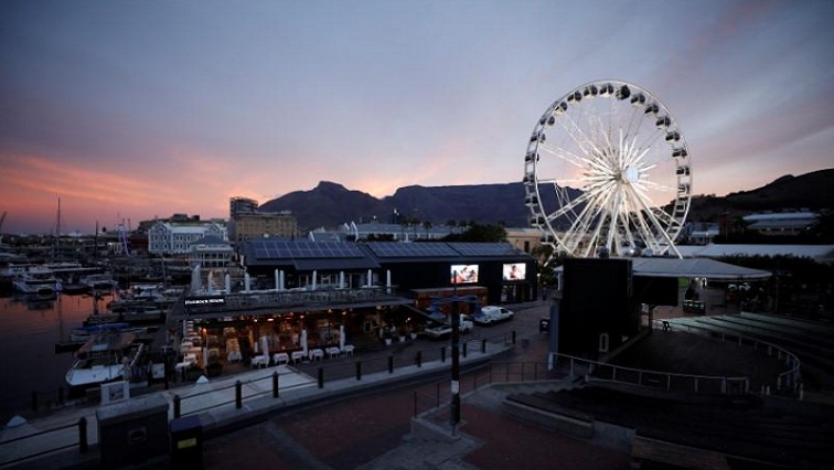 Dusk falls in the popular Waterfront district in Cape Town, South Africa, shortly before President Cyril Ramaphosa announced a nationwide lockdown to combat the spread of coronavirus disease (COVID-19), on March 23, 2020.