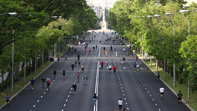 Scores of joggers and cyclists poured down Madrid’s six-lane Castellana Avenue on Saturday morning, one of several major transport arteries closed off to vehicles for the weekend.