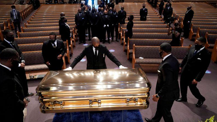 The casket of George Floyd is placed in the chapel during a funeral service for Floyd at the Fountain of Praise church, in Houston.
