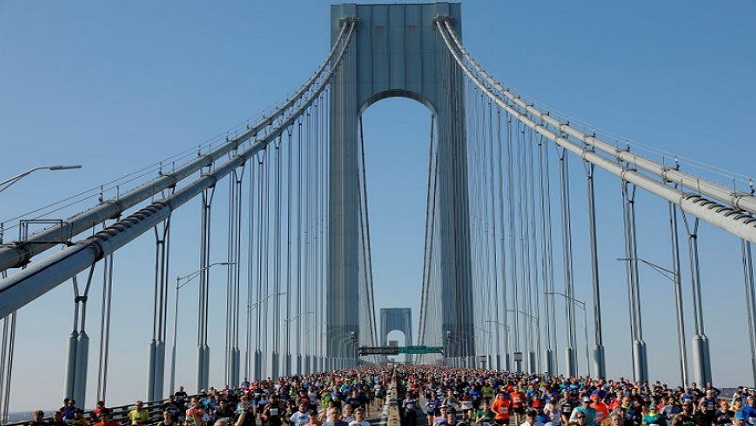 General view of race participants in action on the Verrazzano-Narrows Bridge during the marathon.