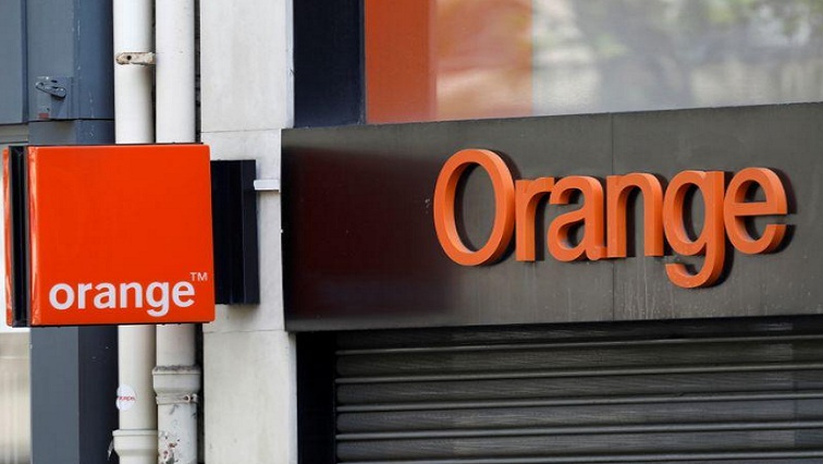 The logo of French telecoms operator Orange is pictured on a closed retail store in Paris, France, April 17, 2020.