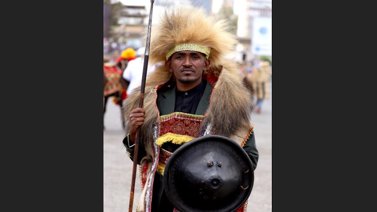 Ethiopian musician Haacaaluu Hundeessaa poses while dressed in a traditional costume during the 123rd anniversary celebration of the battle of Adwa, where Ethiopian forces defeated invading Italian forces, in Addis Ababa, Ethiopia, March 2, 2019.