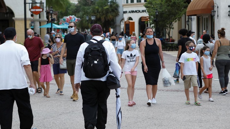 Florida’s Disney World welcomed the public on Saturday for the first time since March with guests required to wear masks, undergo temperature checks and keep physically apart.