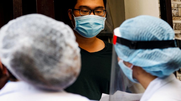Vietnam started mass coronavirus testing in the capital Hanoi, banned gatherings in its economic hub and urged tens of thousands of domestic travellers to report to authorities on Thursday, as the country scrambled to contain the new spread of the virus.
