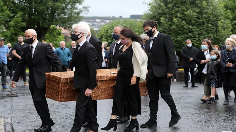 John Hume's coffin is carried into St Eugene's Cathedral in Londonderry, Northern Ireland August 4, 2020.