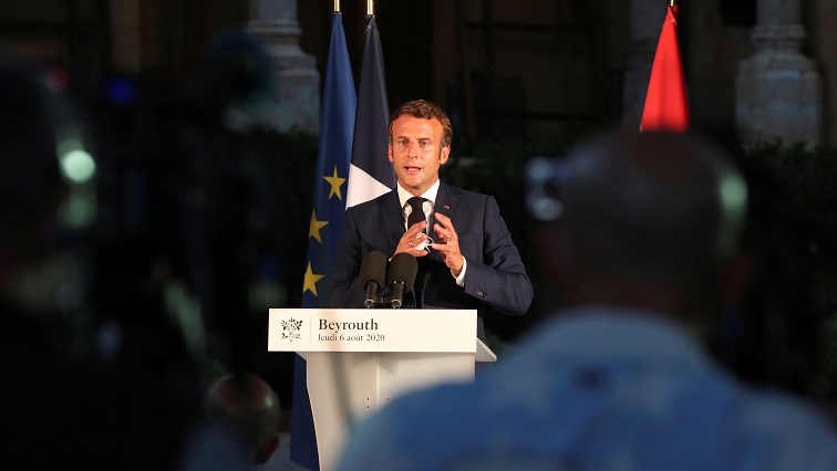 French President Emmanuel Macron delivers his speech during a news conference, following Tuesday's blast in Beirut's port area, in Beirut, Lebanon.