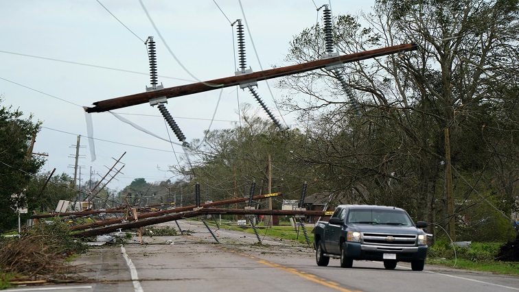 Downed power lines are seen on Highway 90 after Hurricane Laura passed through Iowa, Louisiana.