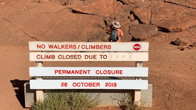 A new permanent closure sign is installed at Uluru, formerly known as Ayers Rock, the day before a permanent ban on climbing the monolith takes effect following a decades-long fight by indigenous people to close the trek, near Yulara, Australia, October 25, 2019.