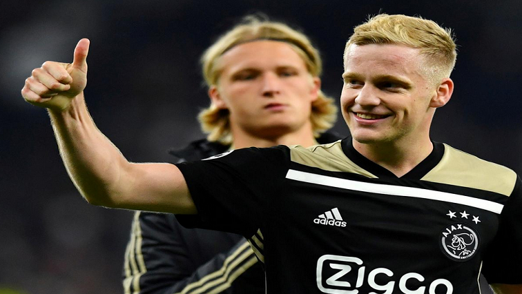 Ajax's Donny van de Beek celebrates after the match.