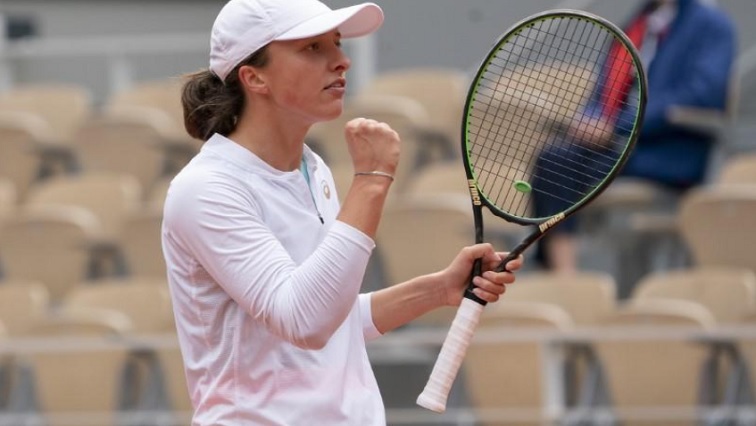 Iga Swiatek (POL) reacts during her match against Nadia Podoroska (ARG) on day 12 at Stade Roland Garros.