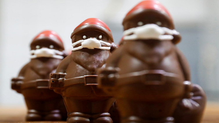 Chocolate Santas wearing protective face masks are seen in the workshop of the Hungarian confectioner, Laszlo Rimoczi, during the coronavirus (COVID-19) outbreak in Lajosmizse, Hungary, on November, 2020.