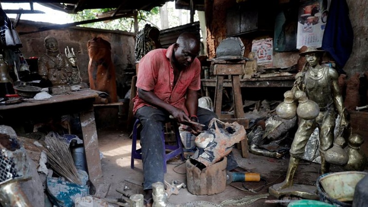 Local bronze sculptor Eric Ogbemudia, 62, works in his studio on Igun street in Benin City, Edo state, Nigeria June 12, 2018.