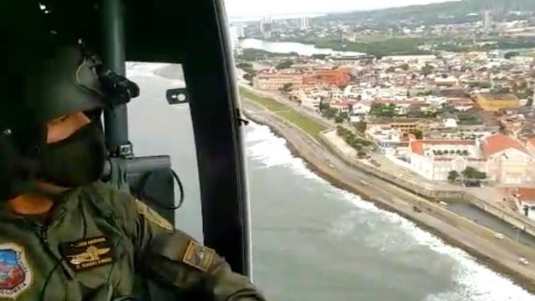 Aerial patrols are conducted over beach areas to prevent entry of swimmers, ahead of Hurricane Iota in Cartagena, Colombia in this still image taken from social media video dated November 15, 2020.