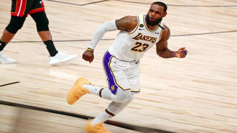 Los Angeles Lakers forward LeBron James (23) celebrates after a play against the Miami Heat during the fourth quarter in game six of the 2020 NBA Finals at AdventHealth Arena. The Los Angeles Lakers won 106-93 to win the series.