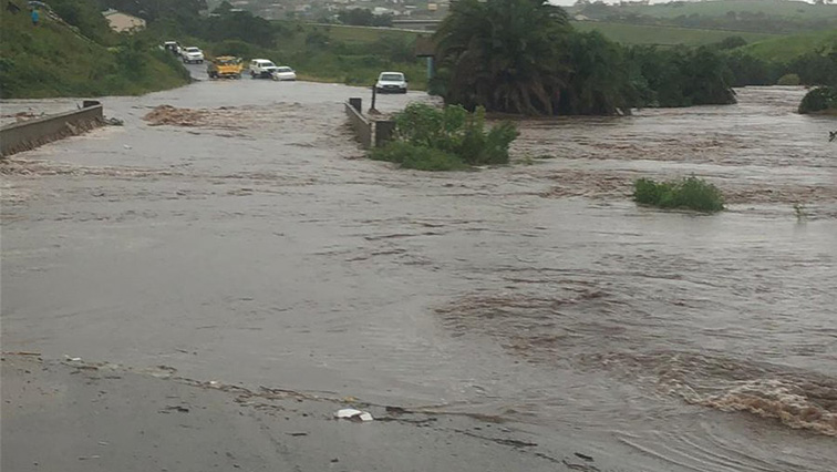 It is alleged that a taxi lost control while crossing a bridge and was swept away by rapid waters.
