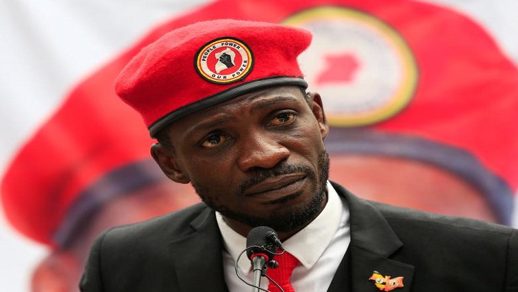 Bobi Wine spoke to Reuters from his garden, wearing a red beret with the words "People Power. Our Power."