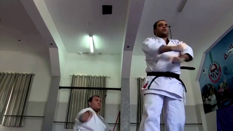The 24-year-old orange belt showed his stick-fighting skills as he trained with his coach at Gaza’s Al-Mashtal Club for Martial Arts.