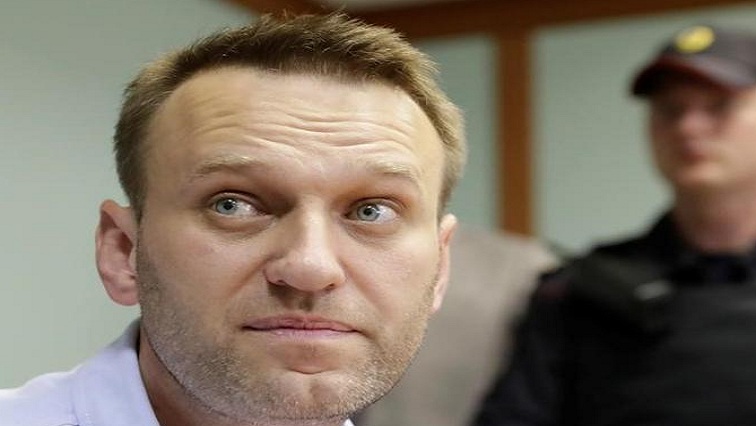 Four masked police officers detained Navalny at passport control on Sunday evening as he returned to Russia after being treated in Germany for what German military tests showed was poisoning by a Novichok nerve agent, a version of events the Kremlin rejects.
