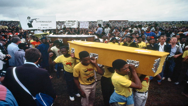 In this file photo, mourners are carrying coffins of those who were killed by the South African police on this day in Langa, 36 years ago.