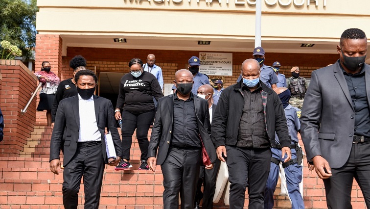 Economic Freedom Fighters (EFF) leader Julius Malema and the party’s MP Mbuyiseni Ndlozi outside the Randburg Magistrate’s Court.