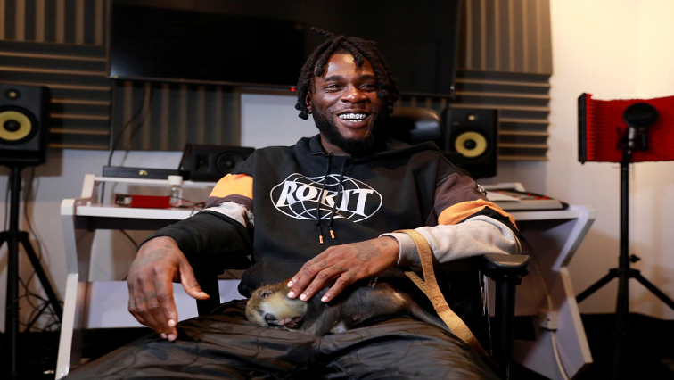 Reclining in a chair in his home studio, Burna Boy reflected on his success.
