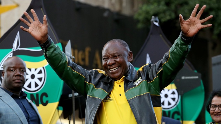 President Cyril Ramaphosa waves to supporters of the ANC at an election victory rally in Johannesburg on May 12, 2019.