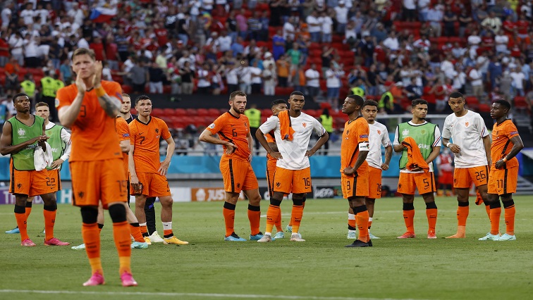 Netherlands' players look dejected after the match.