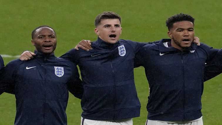 England's Raheem Sterling, Mason Mount and Reece James line up before the match.