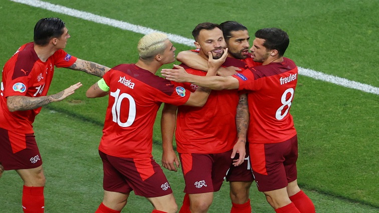 Switzerland's Haris Seferovic celebrates scoring their first goal with Granit Xhaka, Remo Freuler and teammates.