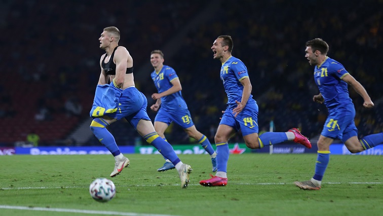 Ukraine's Artem Dovbyk celebrates scoring their second goal.
