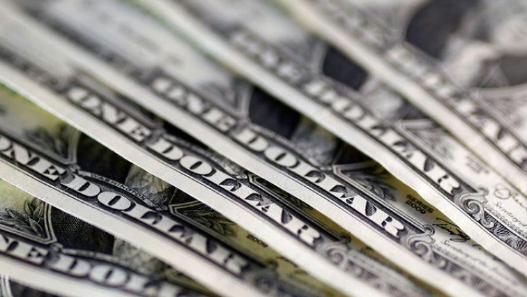 The dollar, which soared to more than two-month highs following the Fed meeting, gave up some ground on Friday.