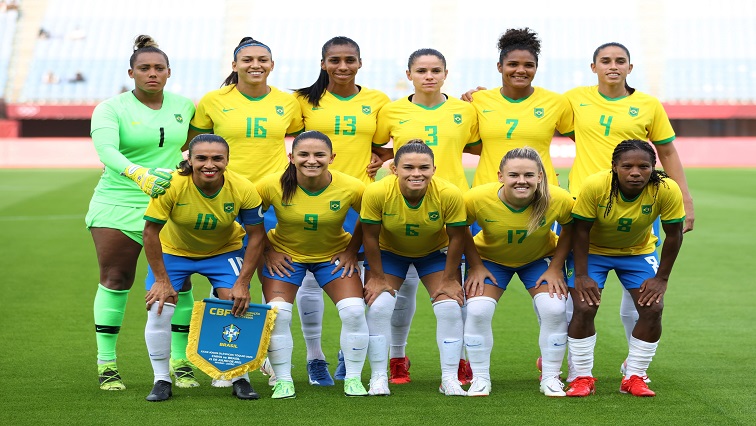Brazil players pose for a team group photo before the match.