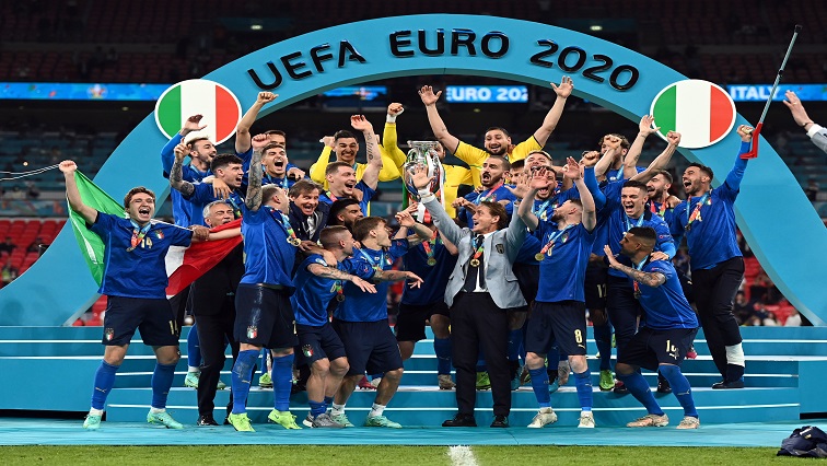 Italy celebrate with the trophy after winning Euro 2020.