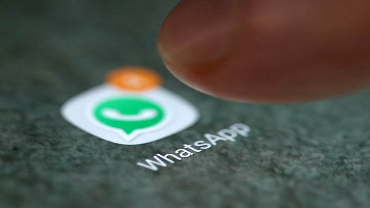 The WhatsApp messaging application is seen on a phone screen on August 3, 2017.
