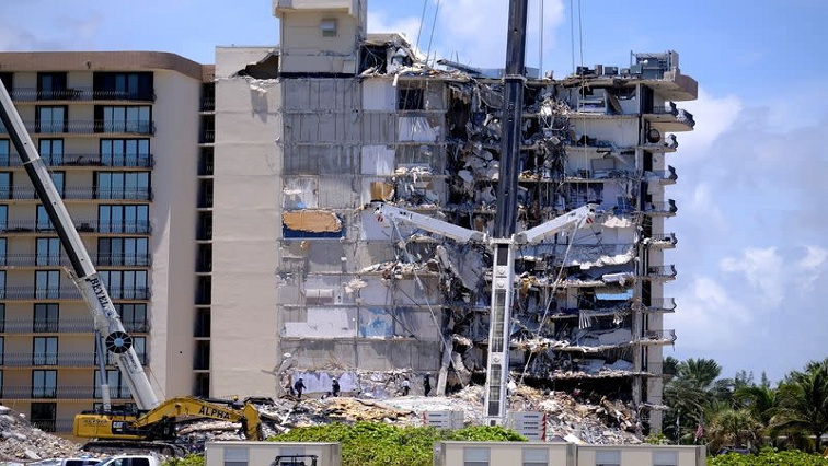 The latest remains recovered from the rubble left behind by the 12-story Champlain Towers South in nearby Surfside left 126 people listed as still missing and feared dead.