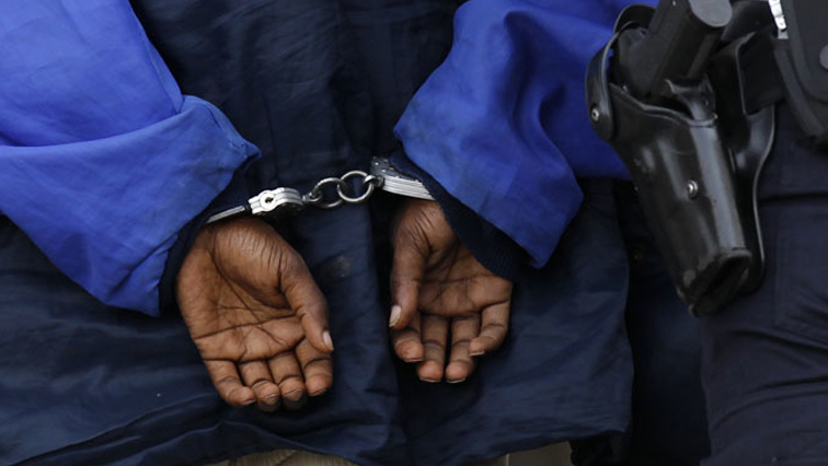 A demonstrator is placed in handcuffs in Washington, USA