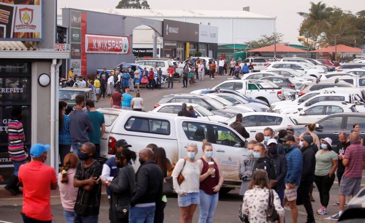 People waiting to buy food at a supermarket  in Hillcrest in KZN when most stores stayed closed during protests