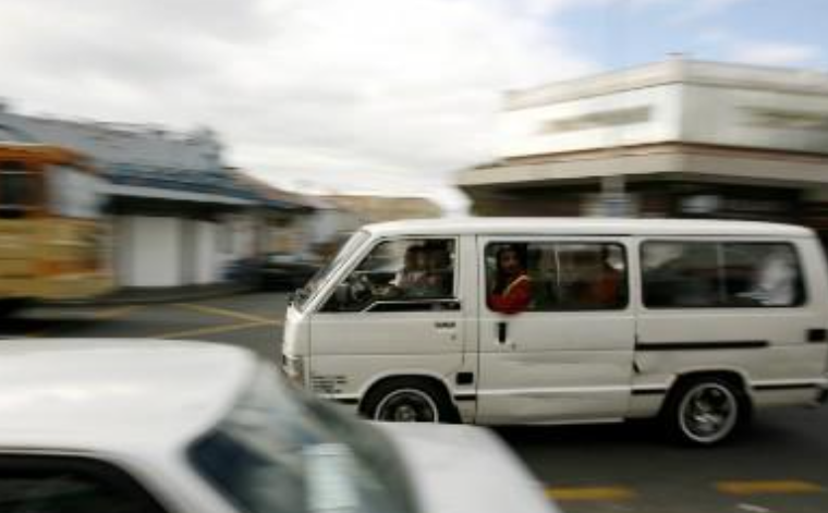 Minibus taxis ferry passengers in Cape Town August 15, 2007.